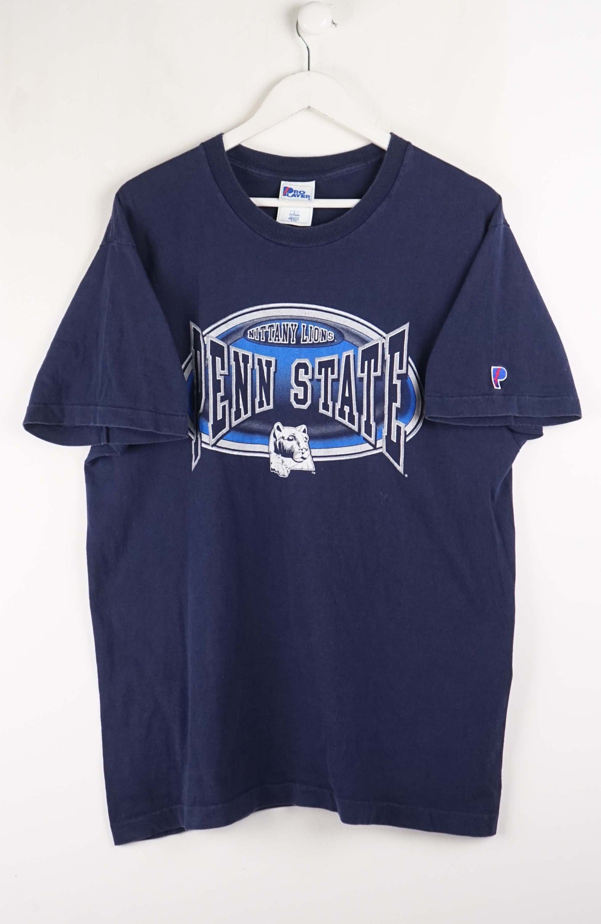 Navy blue t-shirt with 'Penn State' logo on a white background