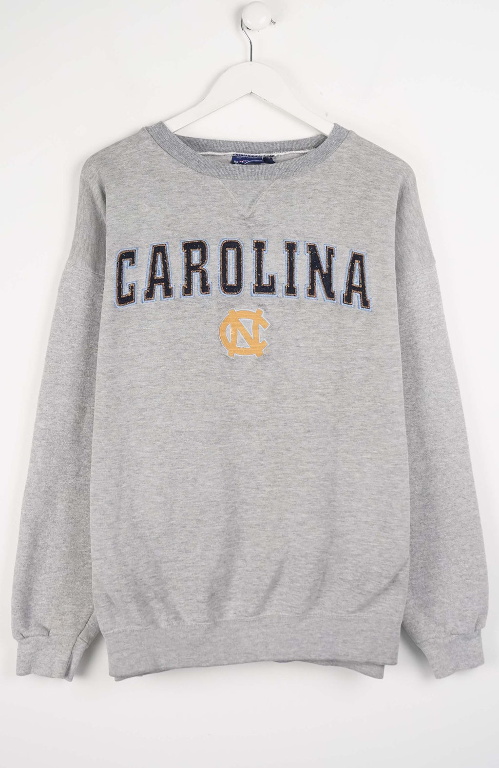 Gray sweatshirt with 'Carolina' text on a white background