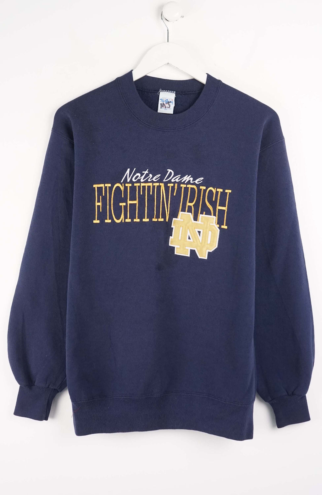 Navy blue sweatshirt with 'Notre Dame Fighting Irish' text and logo on a white background