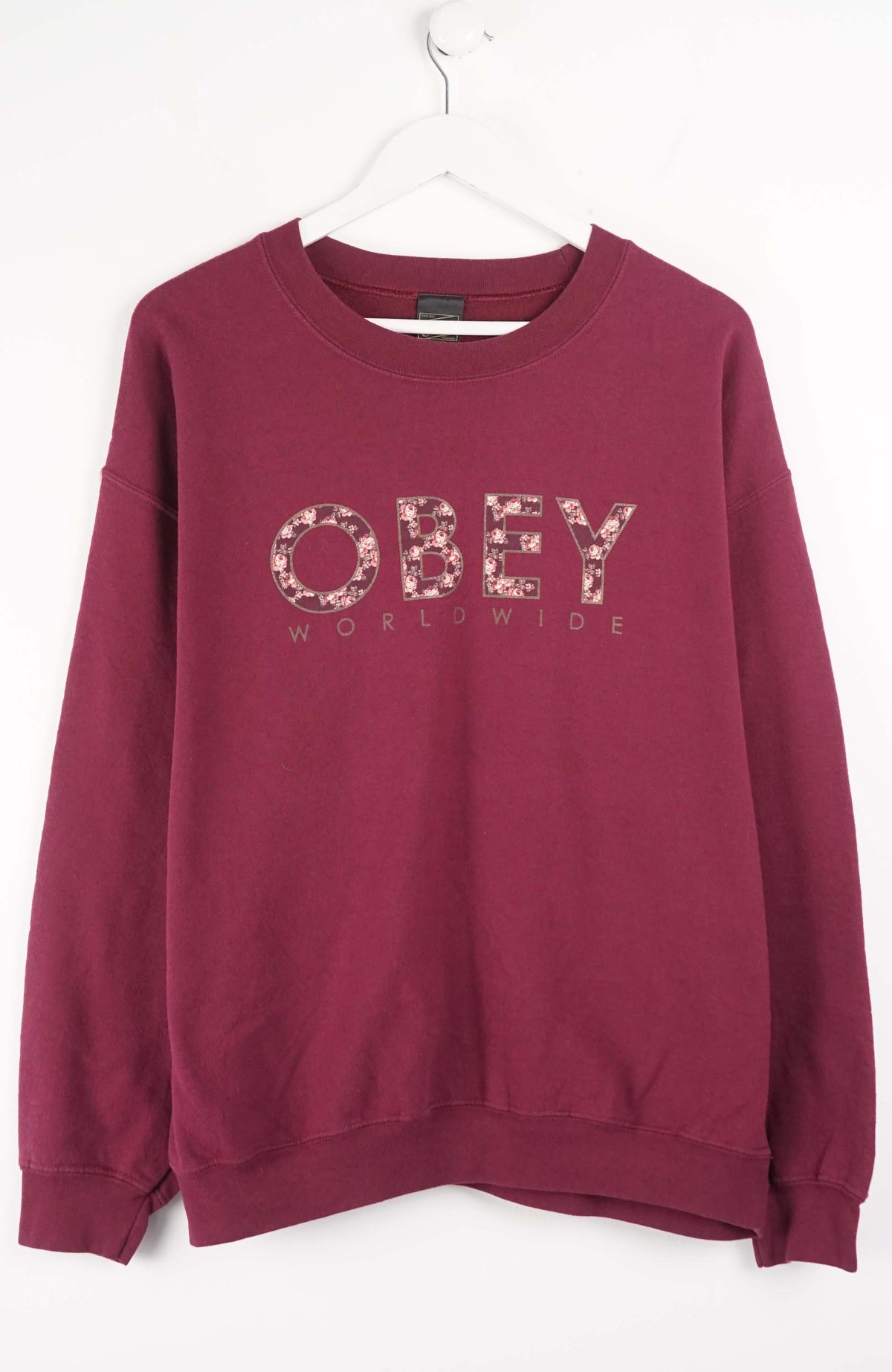 Maroon sweatshirt with 'OBEY' logo on a white background
