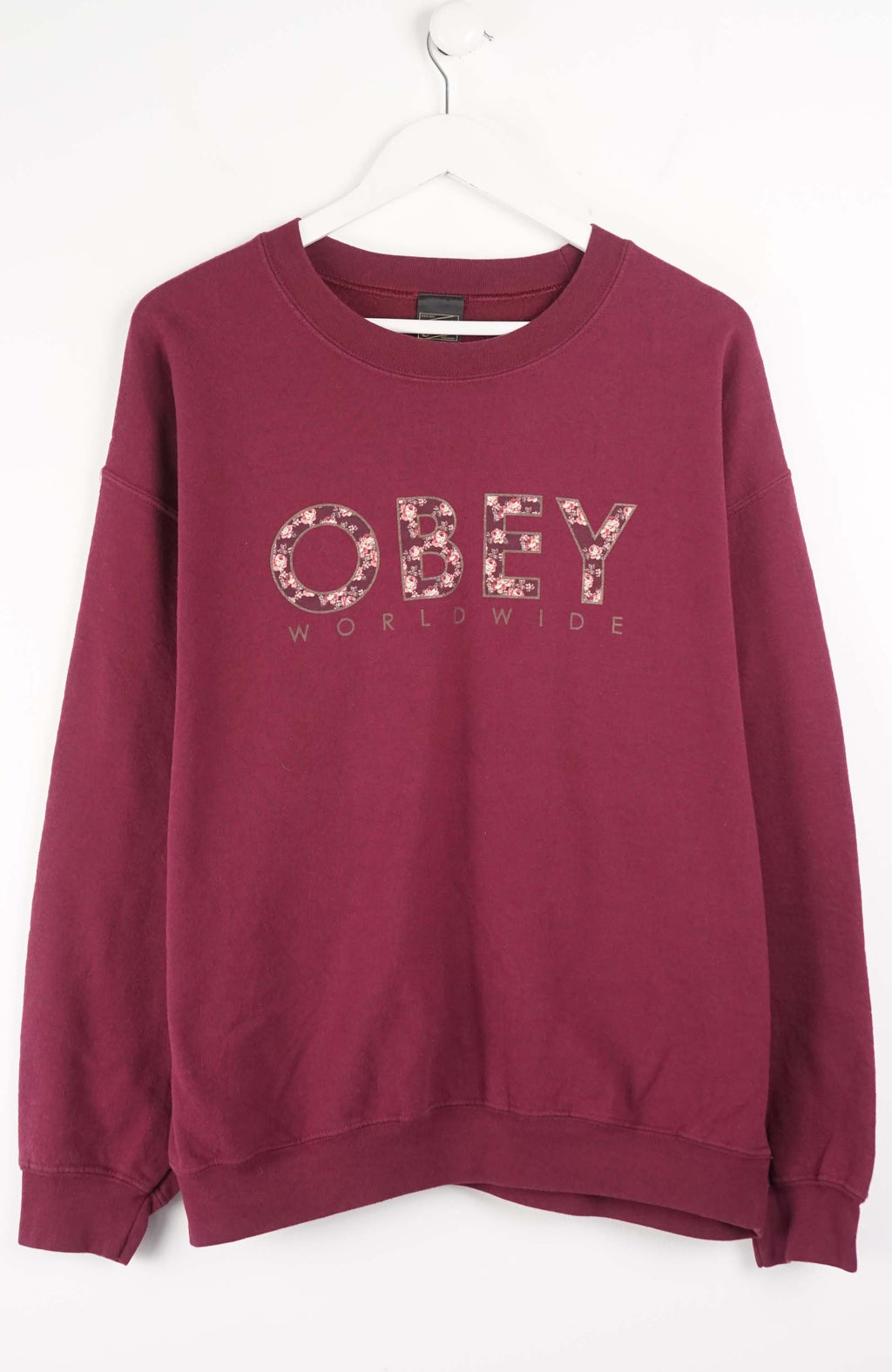 Maroon sweatshirt with 'OBEY' logo on a white background