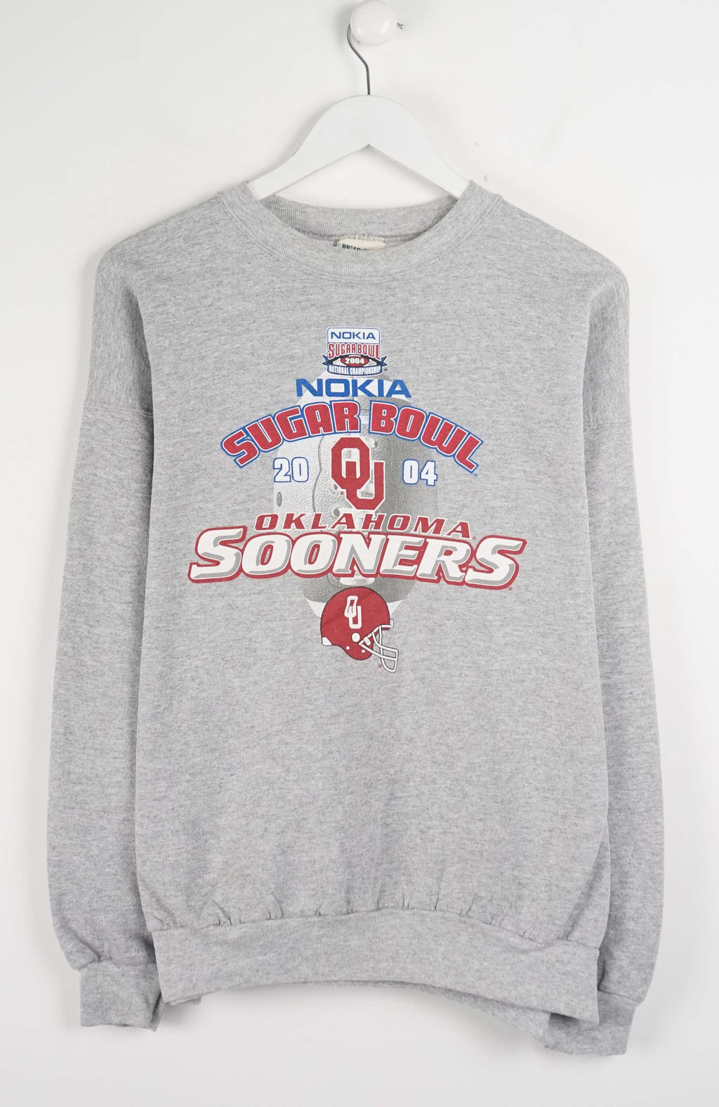 Gray sweatshirt with Oklahoma Sooners and Nokia Sugar Bowl 2004 text on a white background