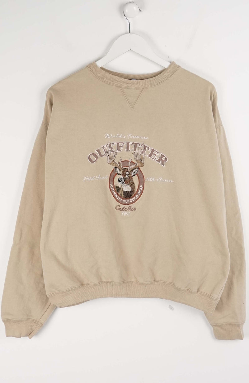 Beige sweatshirt with graphic design on a white background