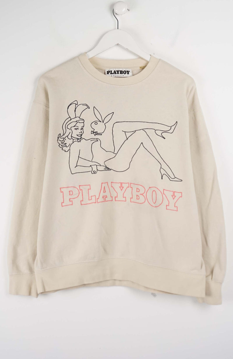 Beige sweatshirt with Playboy graphic on a white background