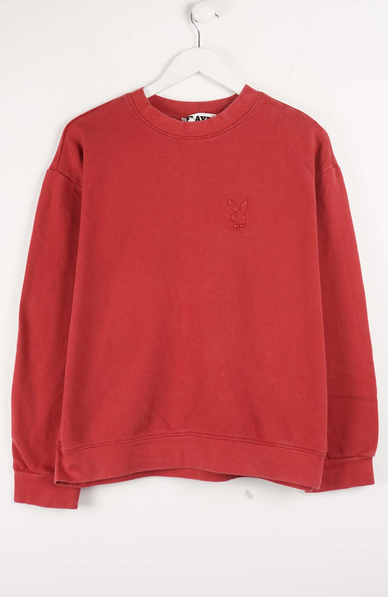 Red sweatshirt with a small logo on a white background
