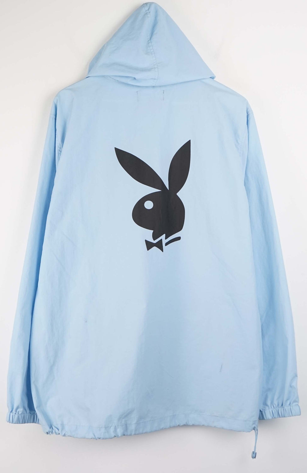 Light blue hooded jacket with a brand logo on a white background