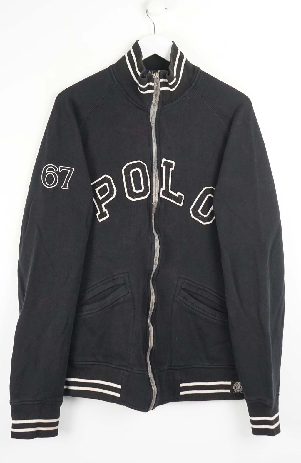 Black jacket with 'Polo' and number '67' on a white background