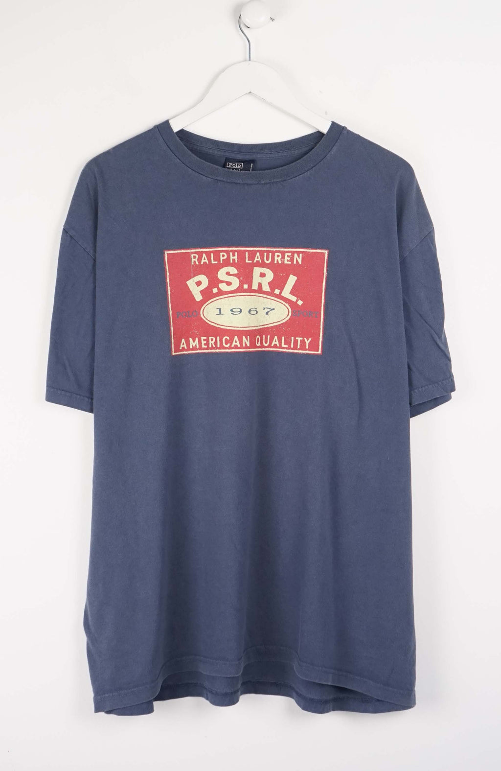 Blue t-shirt with red and white logo on a white background