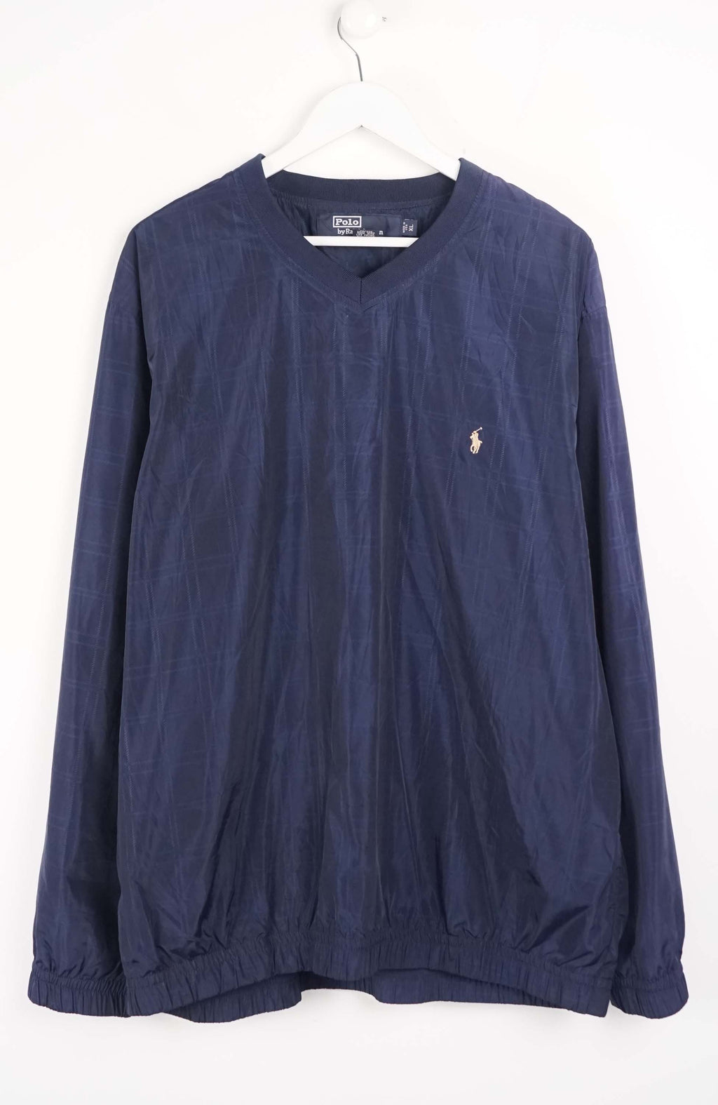 Navy blue long-sleeve shirt with a small logo on a white background