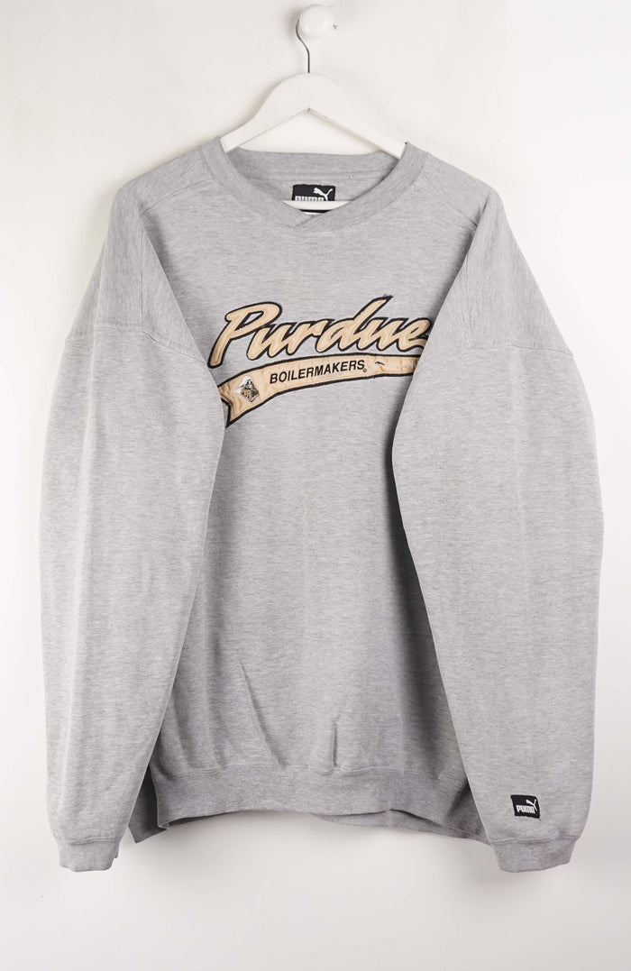 Gray sweatshirt with 'Purdue Boilermakers' text on a white background