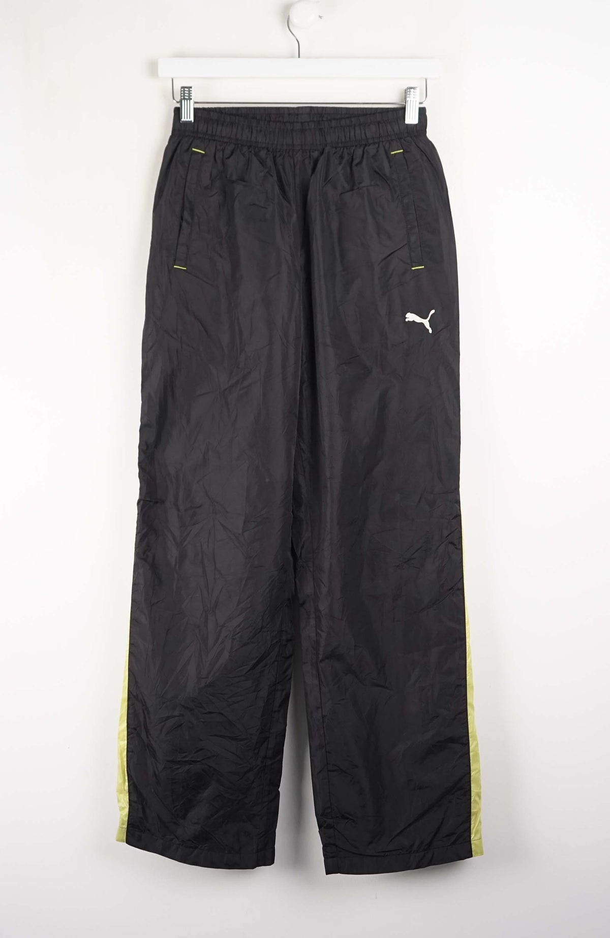 Black pants with a logo on a white background