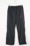 Black pants with red accents on a white background
