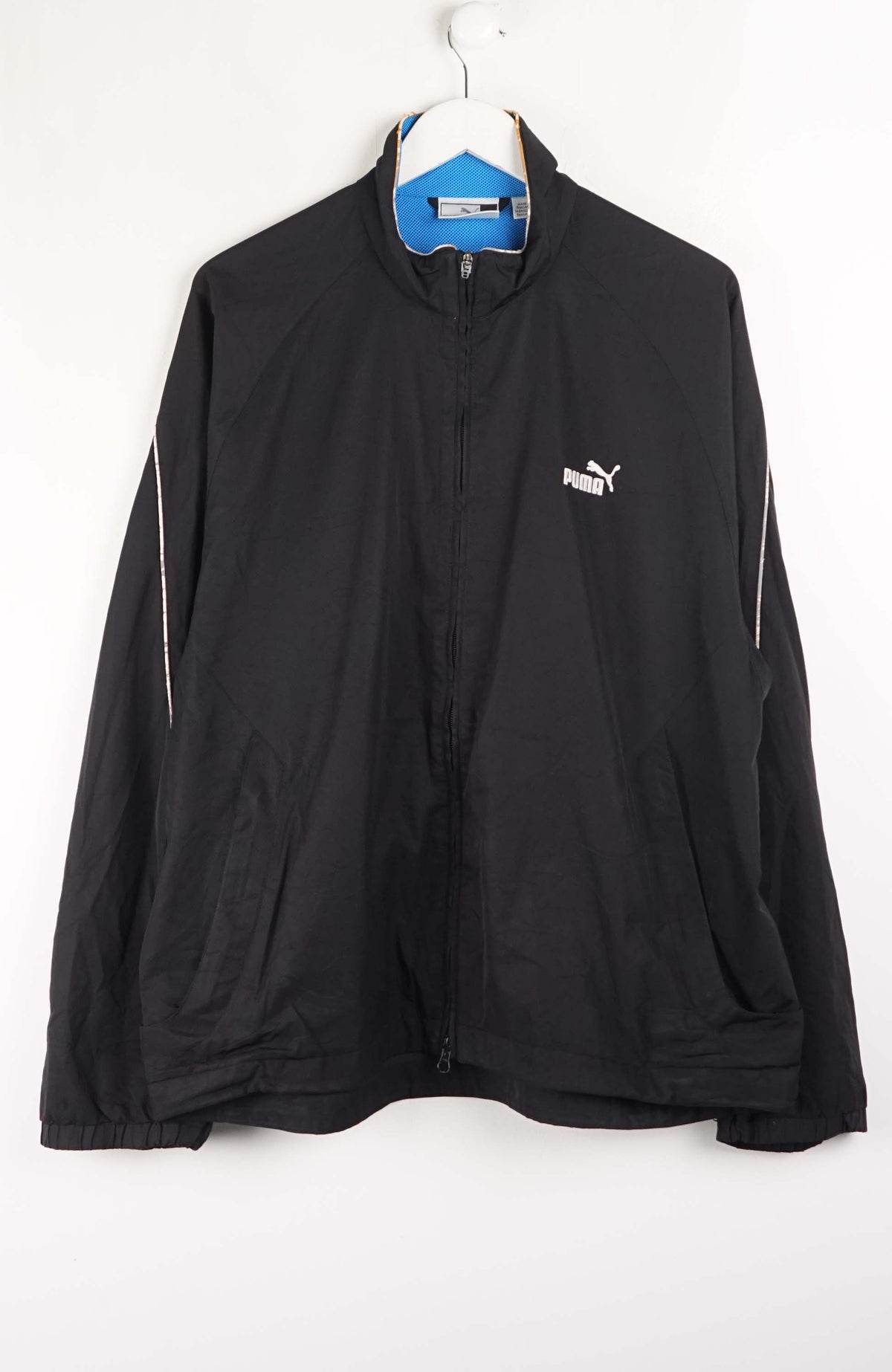 Black jacket with a brand logo on a white background