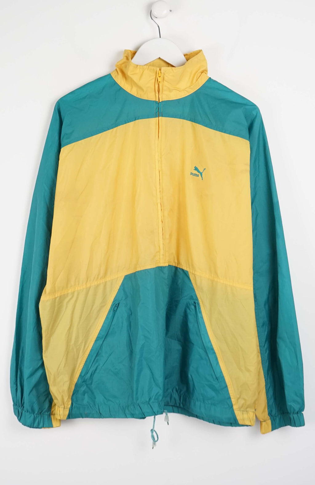 Two-tone green and yellow jacket with a brand logo on a white background