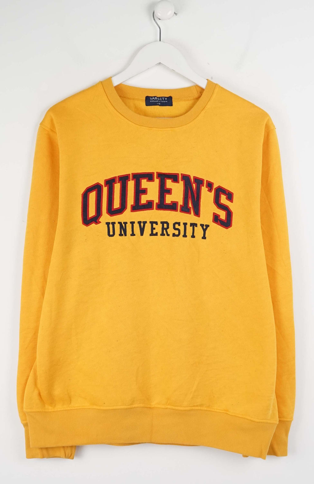 Yellow sweatshirt with 'Queen's University' text on a white background