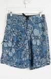 Blue floral-patterned shorts on a white hanger