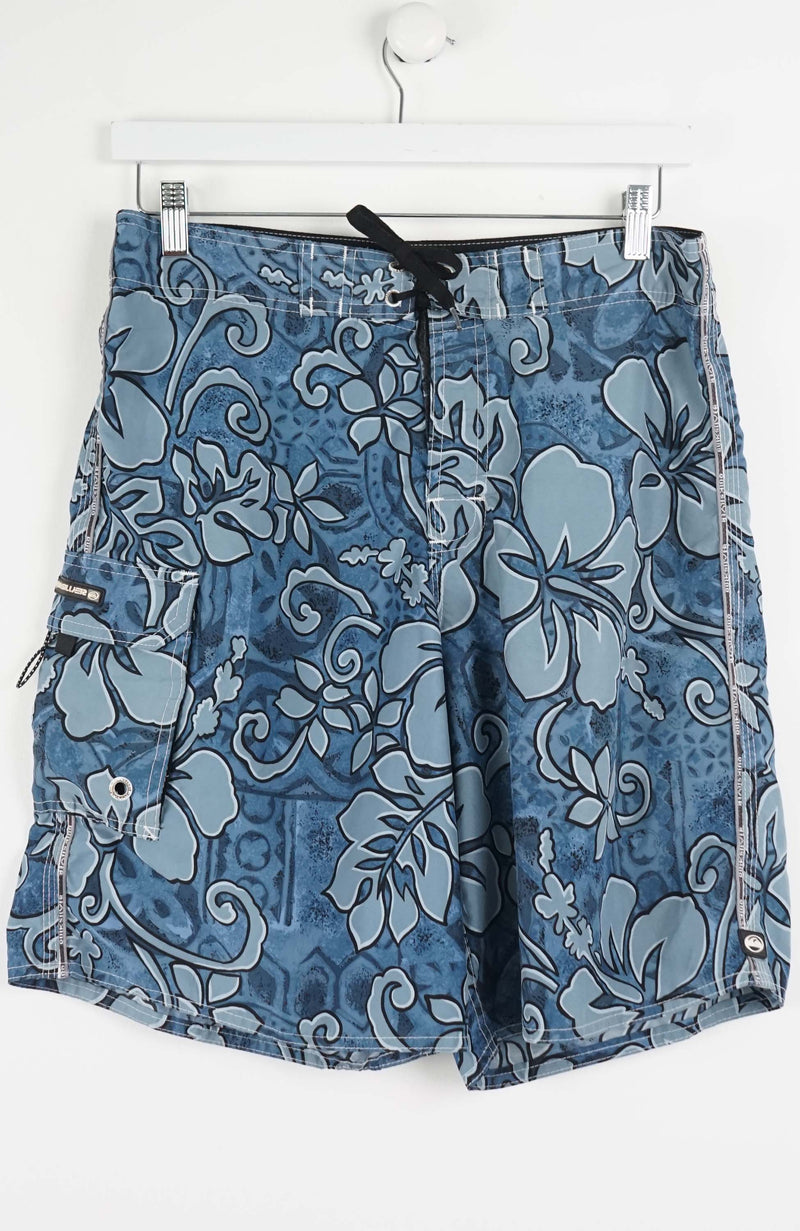Blue floral-patterned shorts on a white hanger