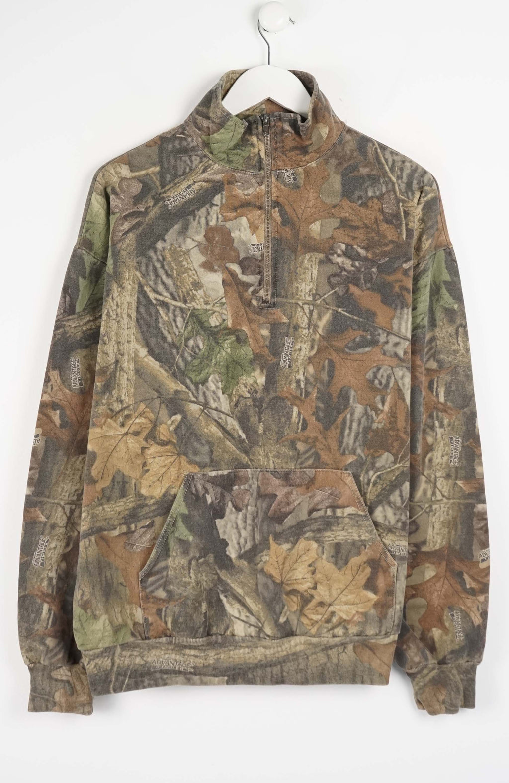 Camouflage hoodie on a white hanger against a white background