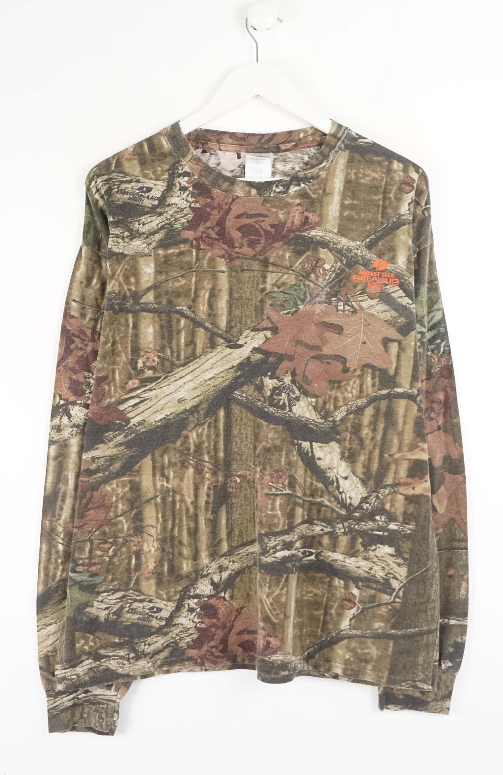 Camouflage-patterned long-sleeve shirt on a white background
