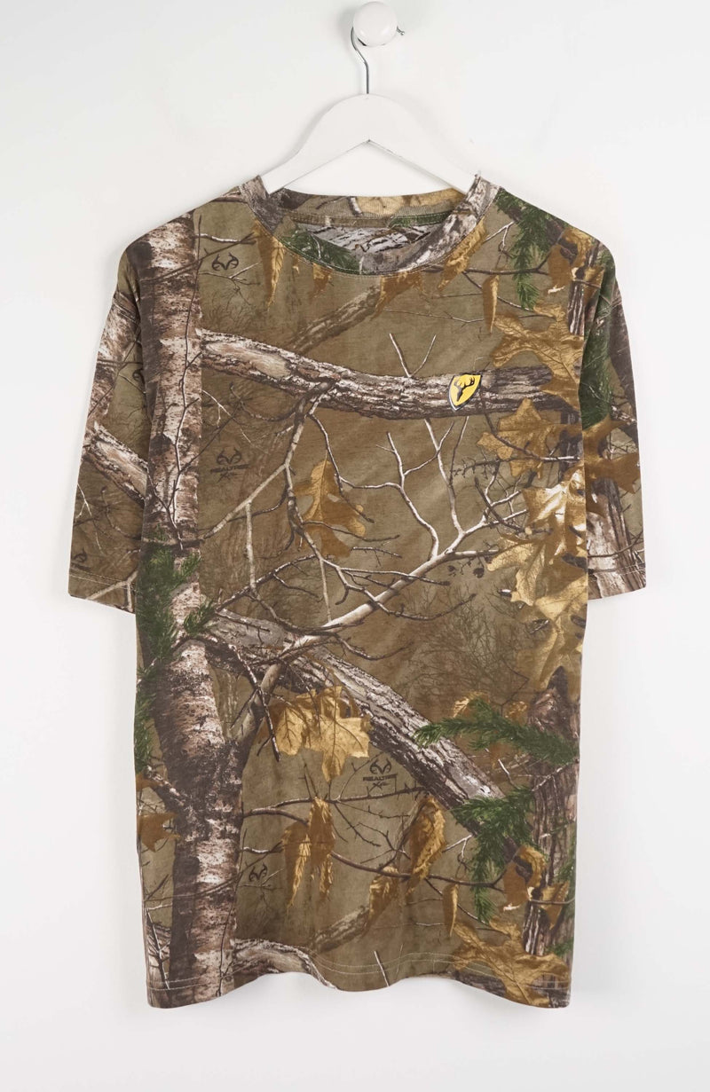 Camouflage-patterned shirt on a white hanger against a white background