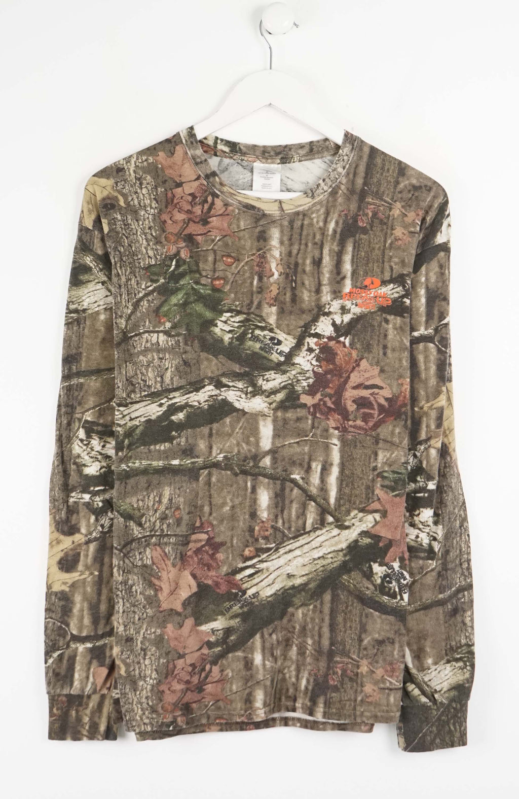Camouflage-patterned long-sleeve shirt on a white background