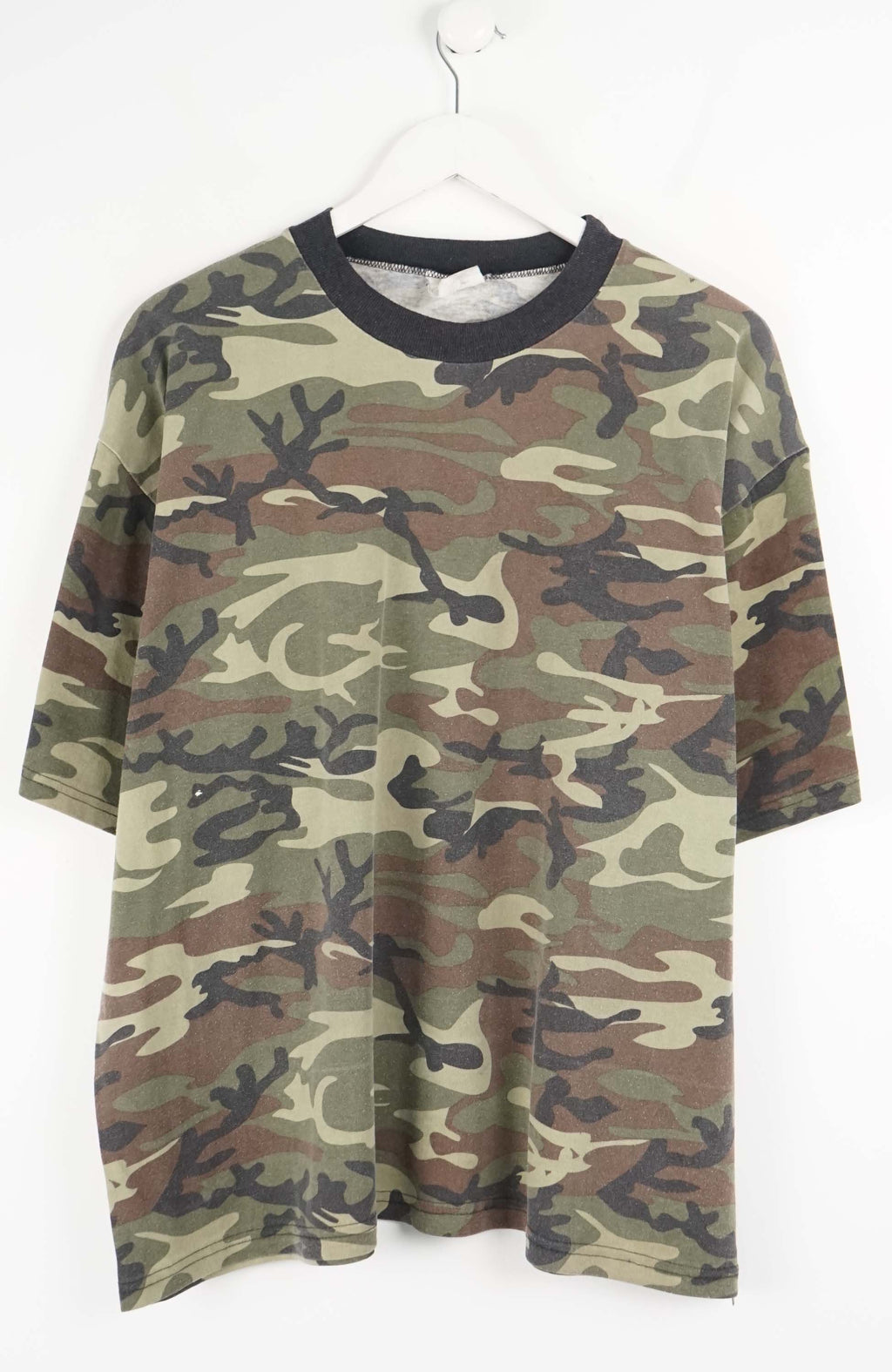 Camouflage t-shirt on a white background
