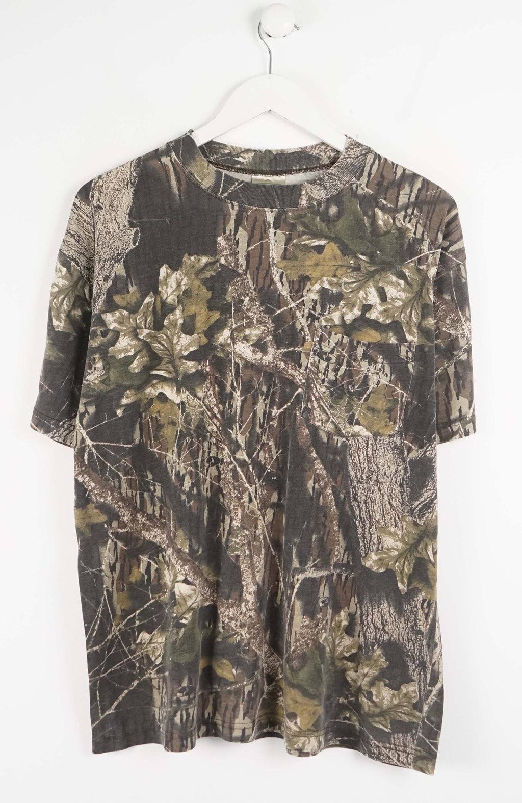 Camouflage-patterned dress on a white background