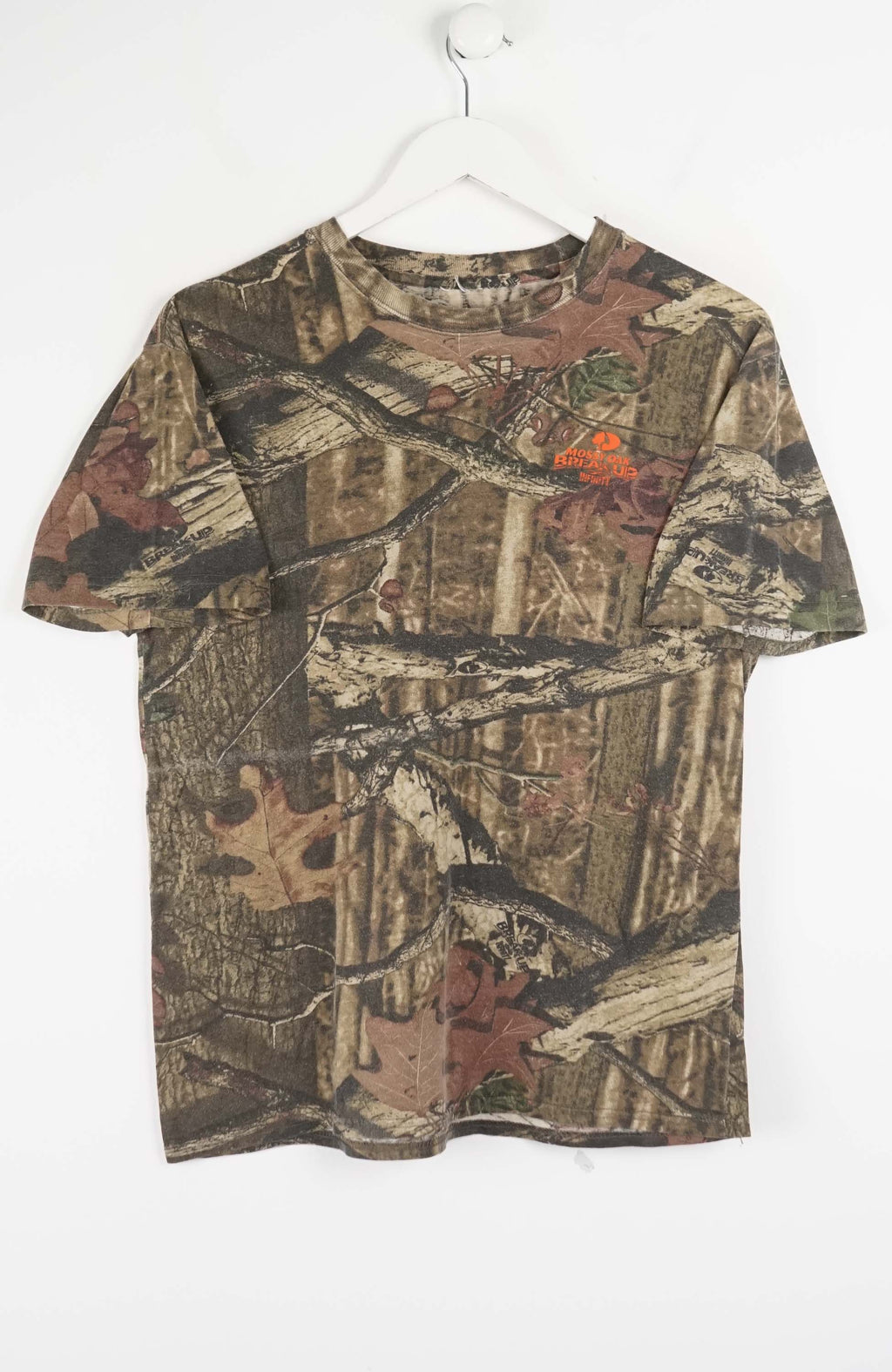 Camouflage-patterned t-shirt with a brand logo on a white background