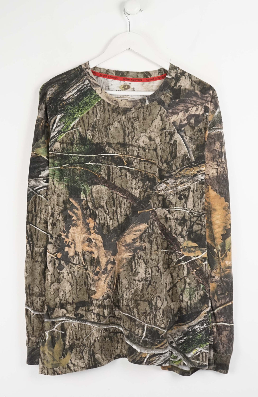 Camouflage long-sleeve shirt on a white background