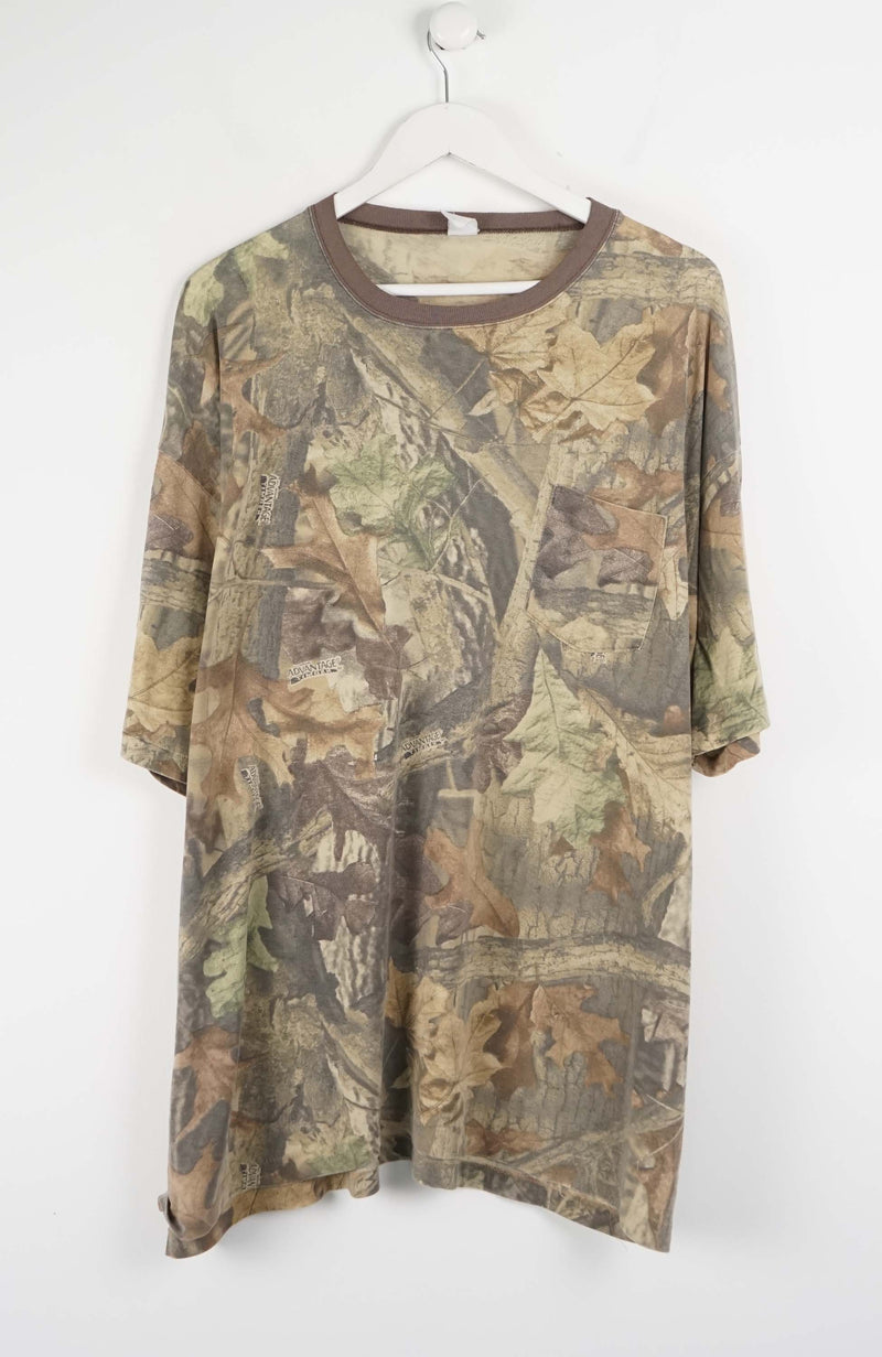 Camouflage-patterned dress on a white hanger against a white background
