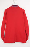 Red Reebok jacket on a white background