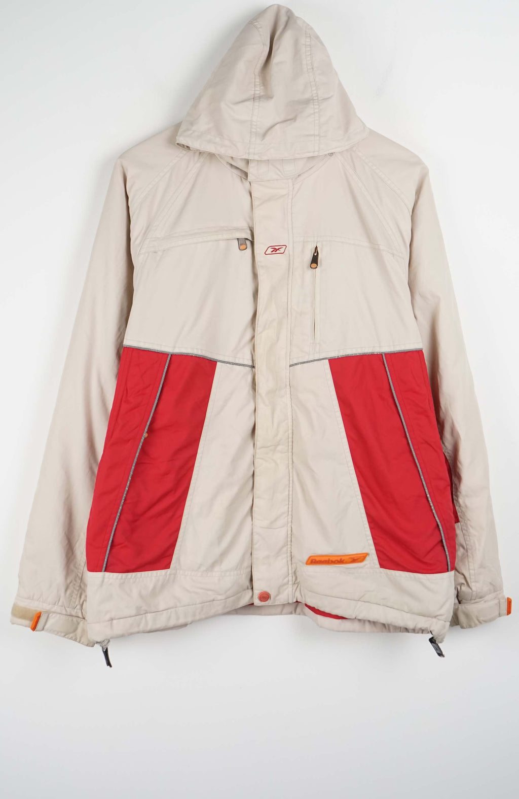 Beige and red jacket with a hood on a white background