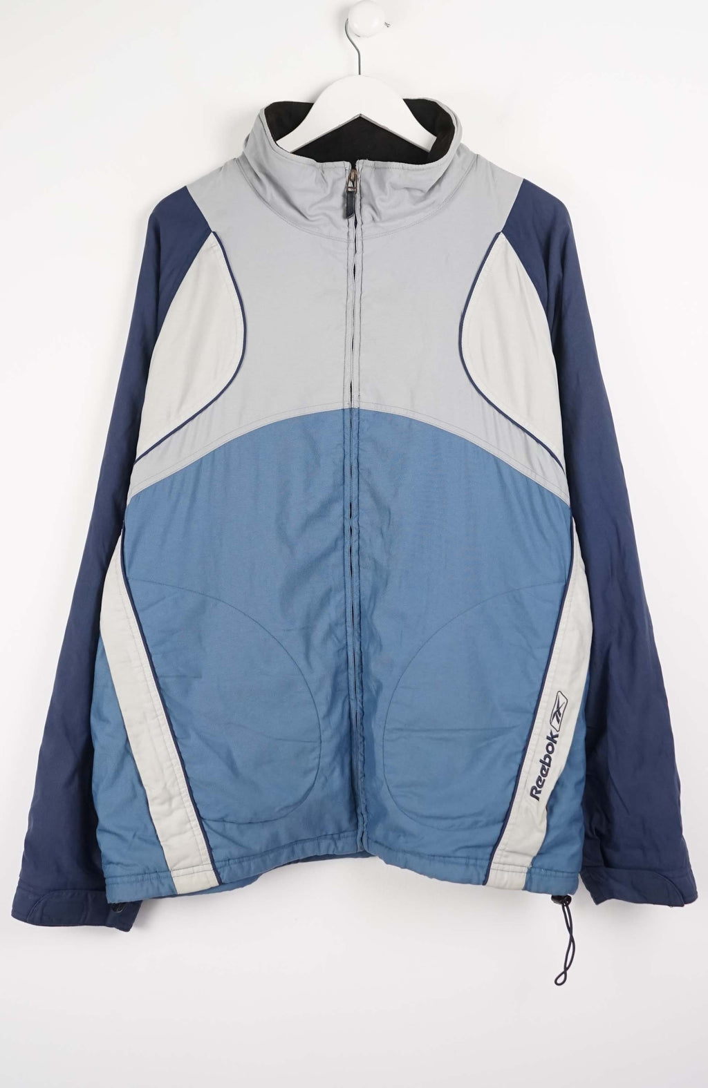 Blue and gray jacket with Reebok logo on a white background