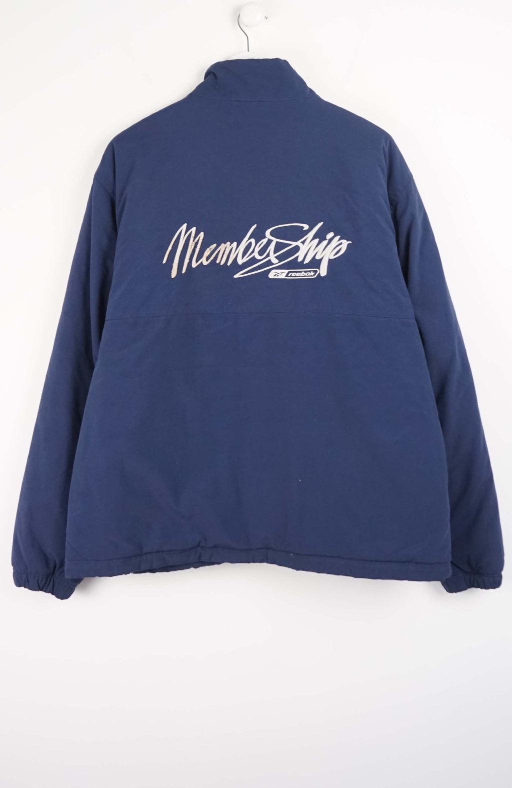 Blue jacket with a brand logo on a white background