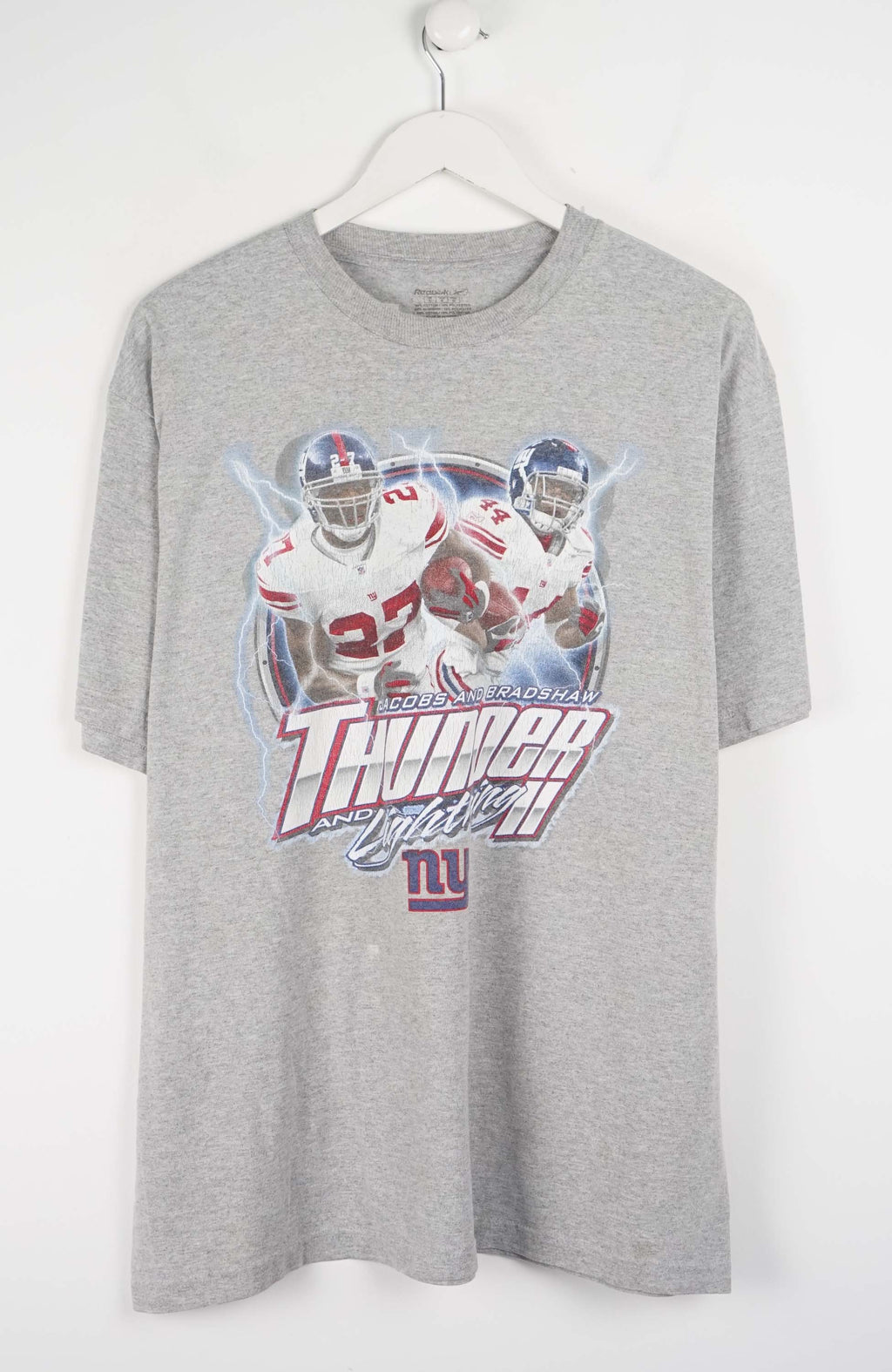 Gray t-shirt with sports-themed graphic on a white background