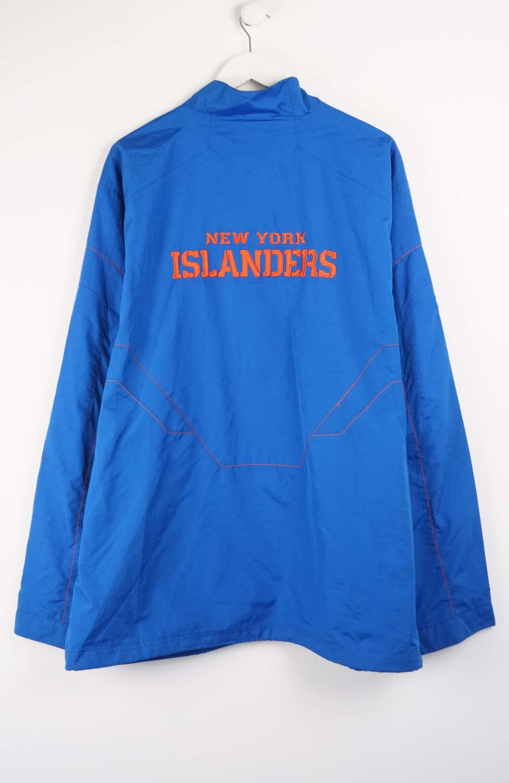 Blue jacket with Reebok logo on a white background