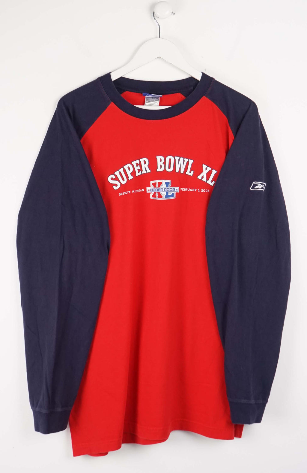 Red and navy long-sleeve shirt with Super Bowl XL logo on a white background