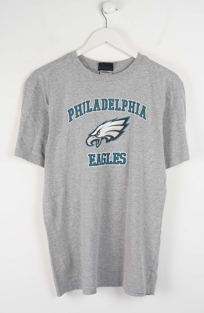 Gray t-shirt with Philadelphia Eagles logo on a white background
