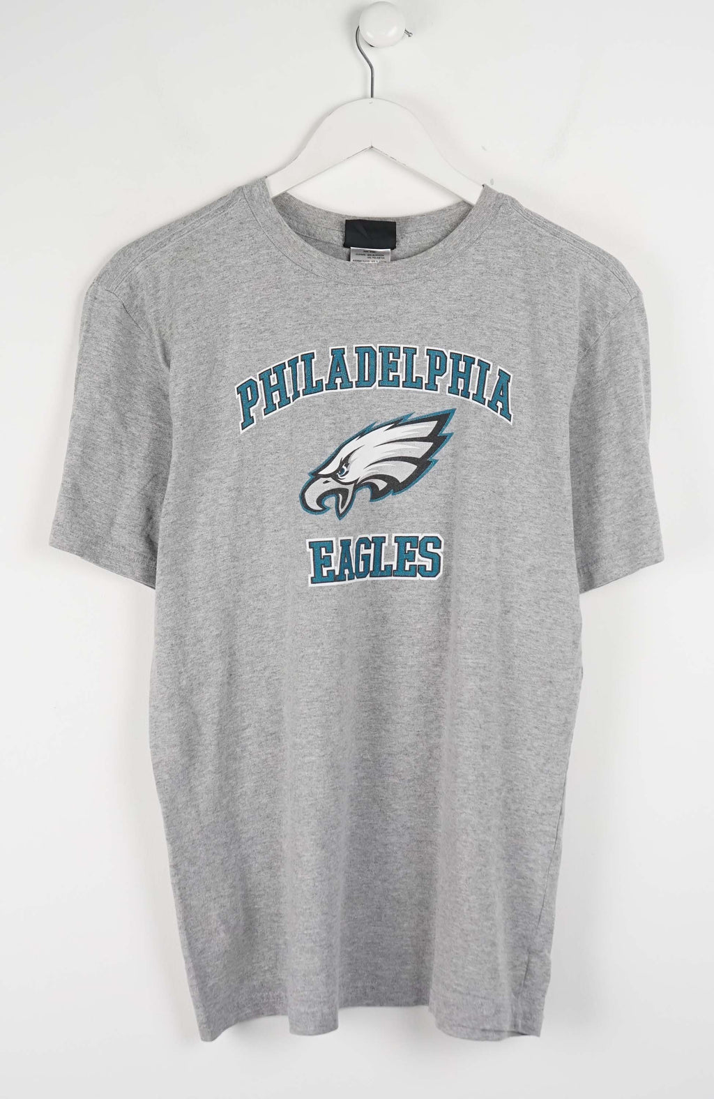 Gray t-shirt with Philadelphia Eagles logo on a white background