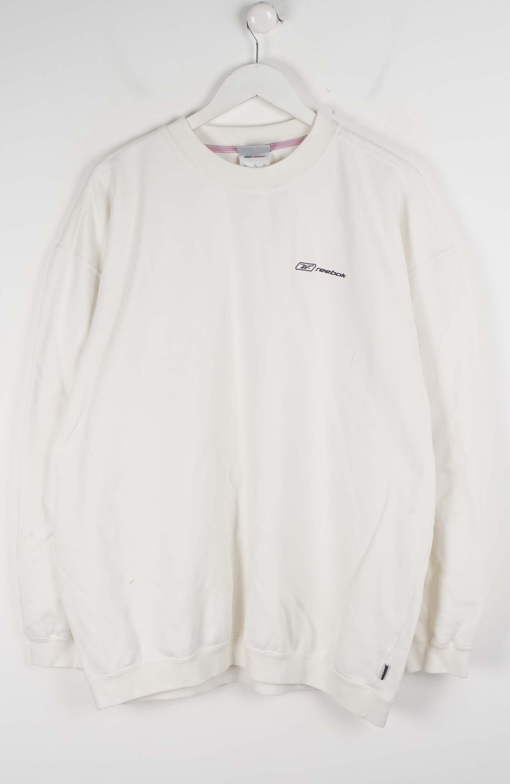 White sweatshirt with a logo on a hanger against a white background