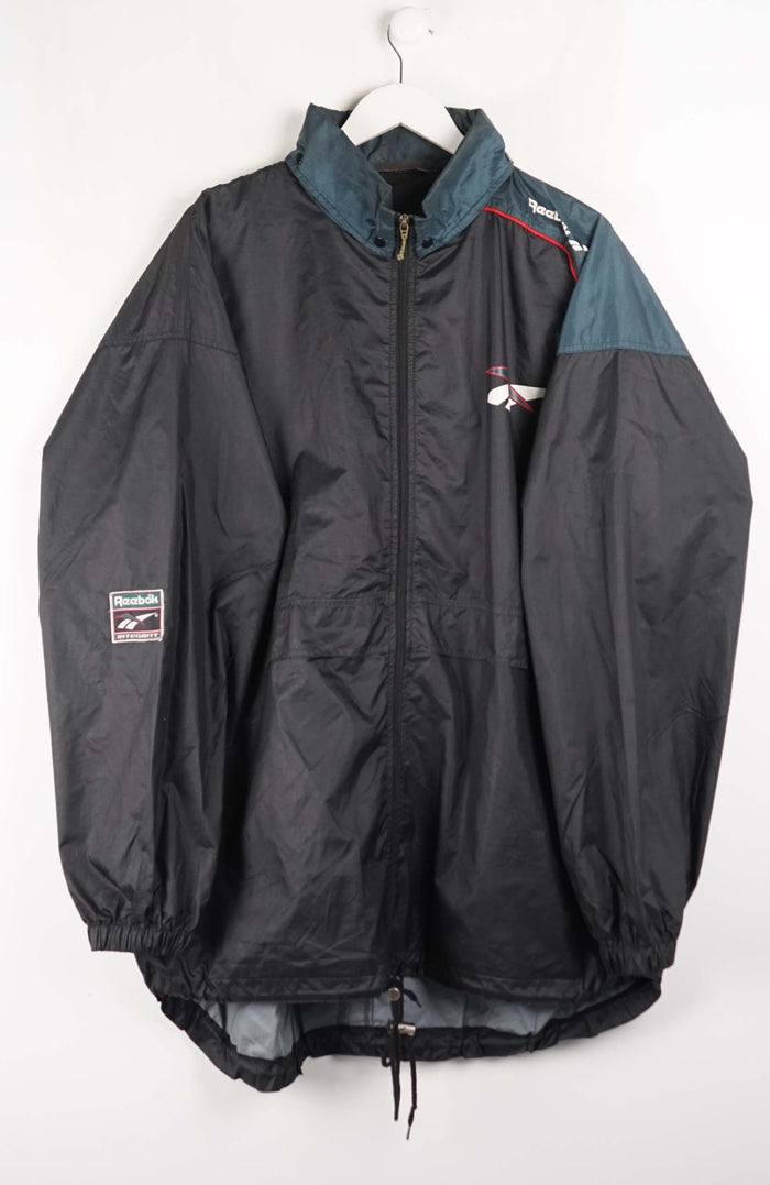 Black jacket with teal accents on a white hanger