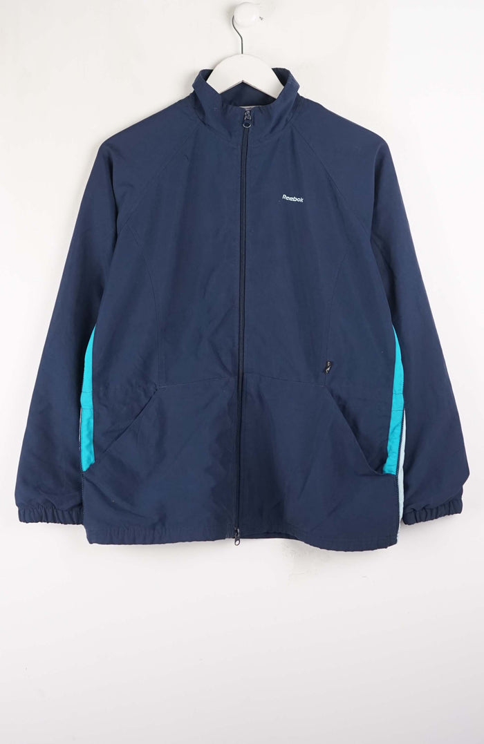 Navy jacket with teal accents on a white background