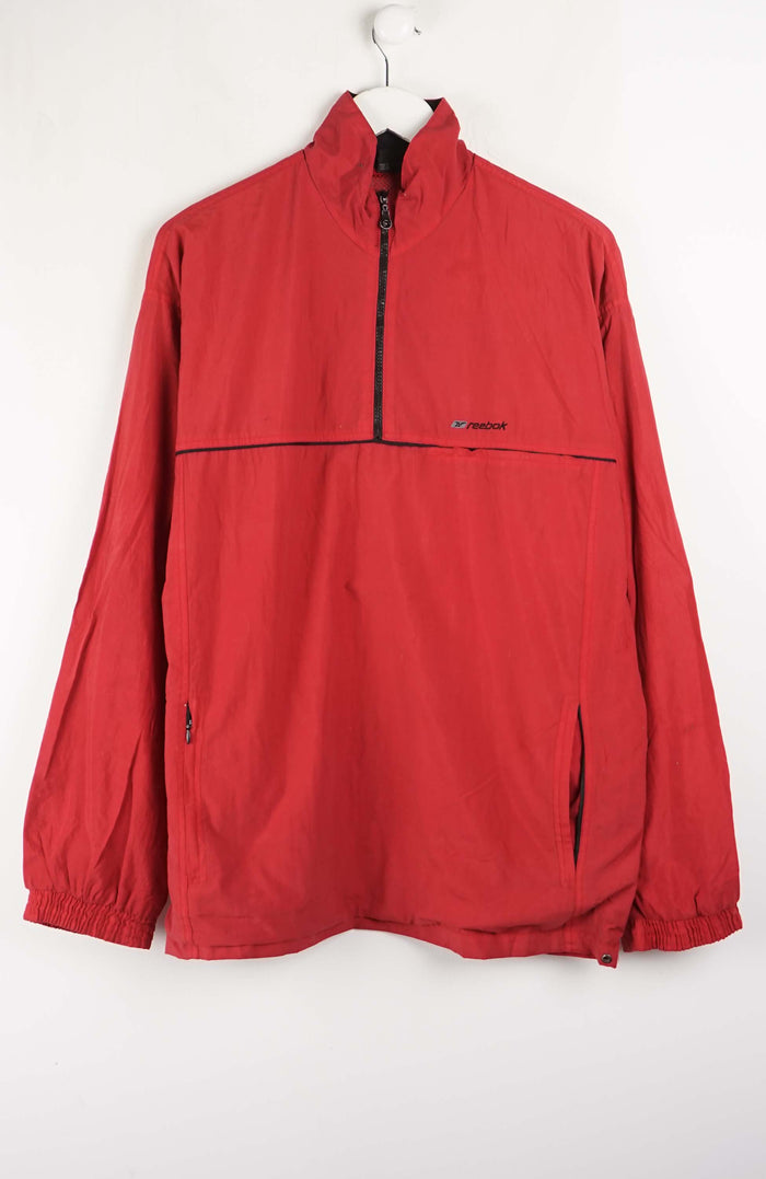 Red jacket with a brand logo on a white background