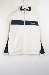 White fleece jacket with navy accents and Reebok logo on a white background