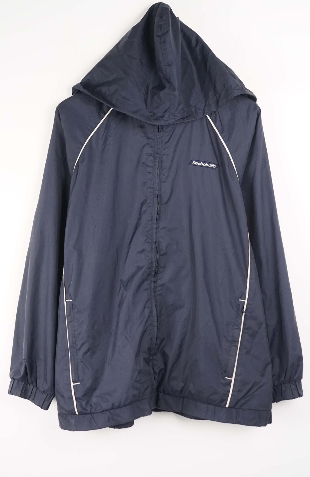 Navy raincoat with white accents on a white background
