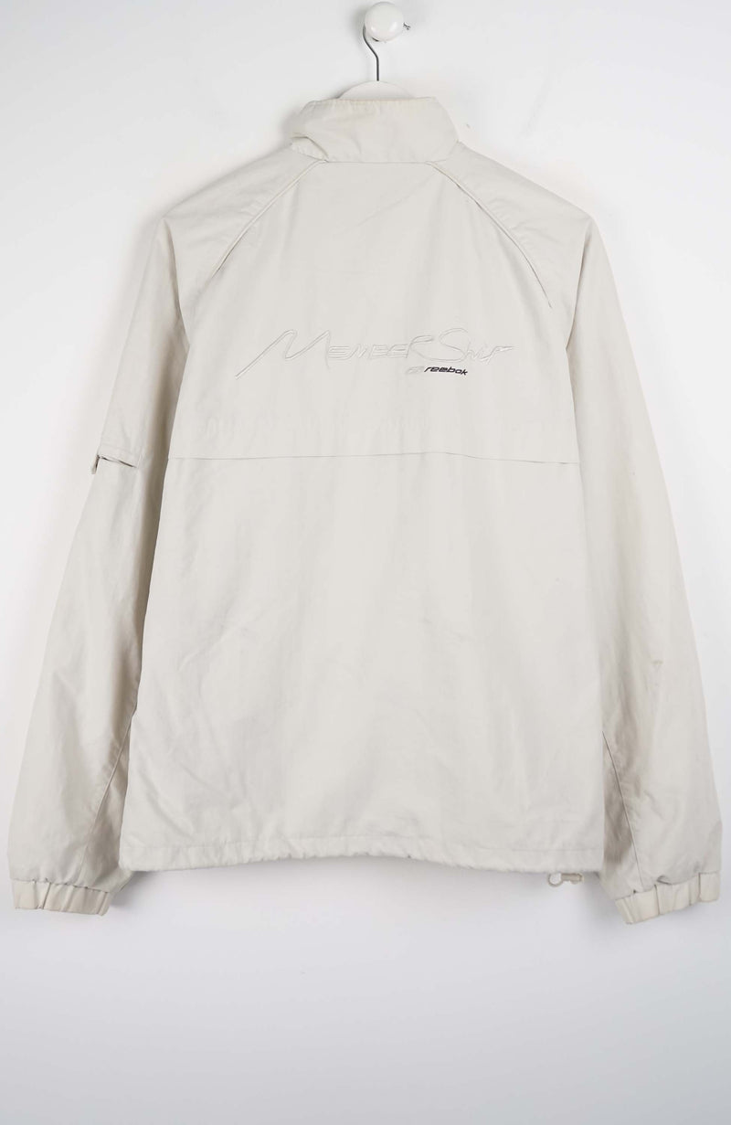 Beige jacket on a white background