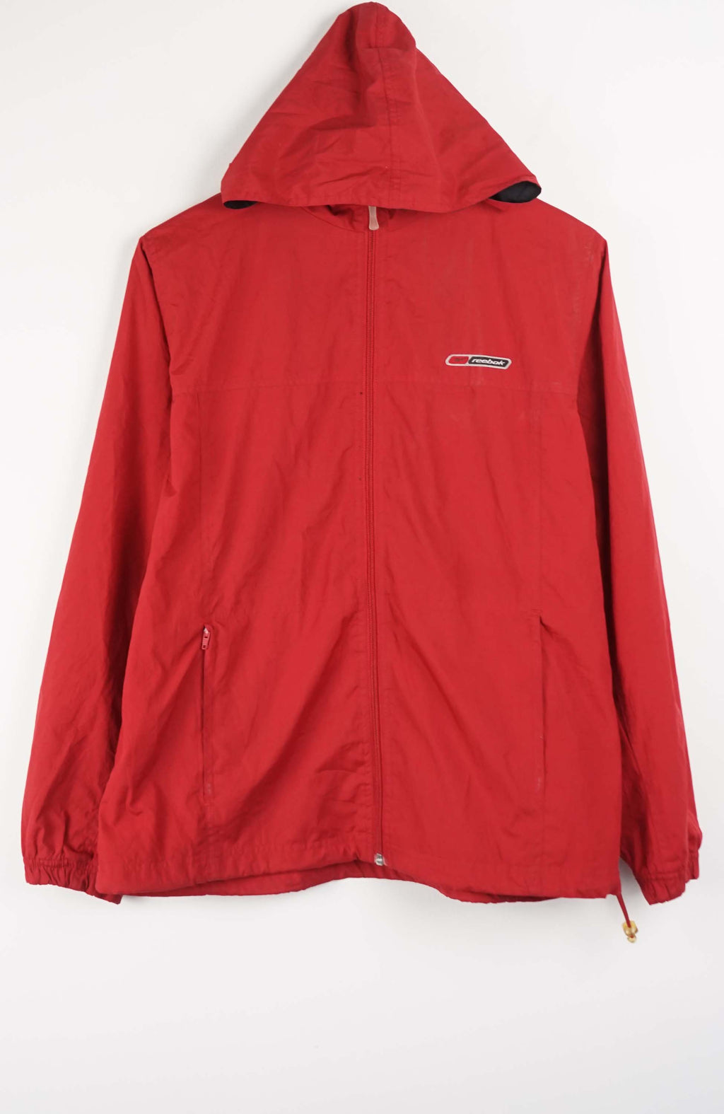 Red jacket with a brand logo on a white background