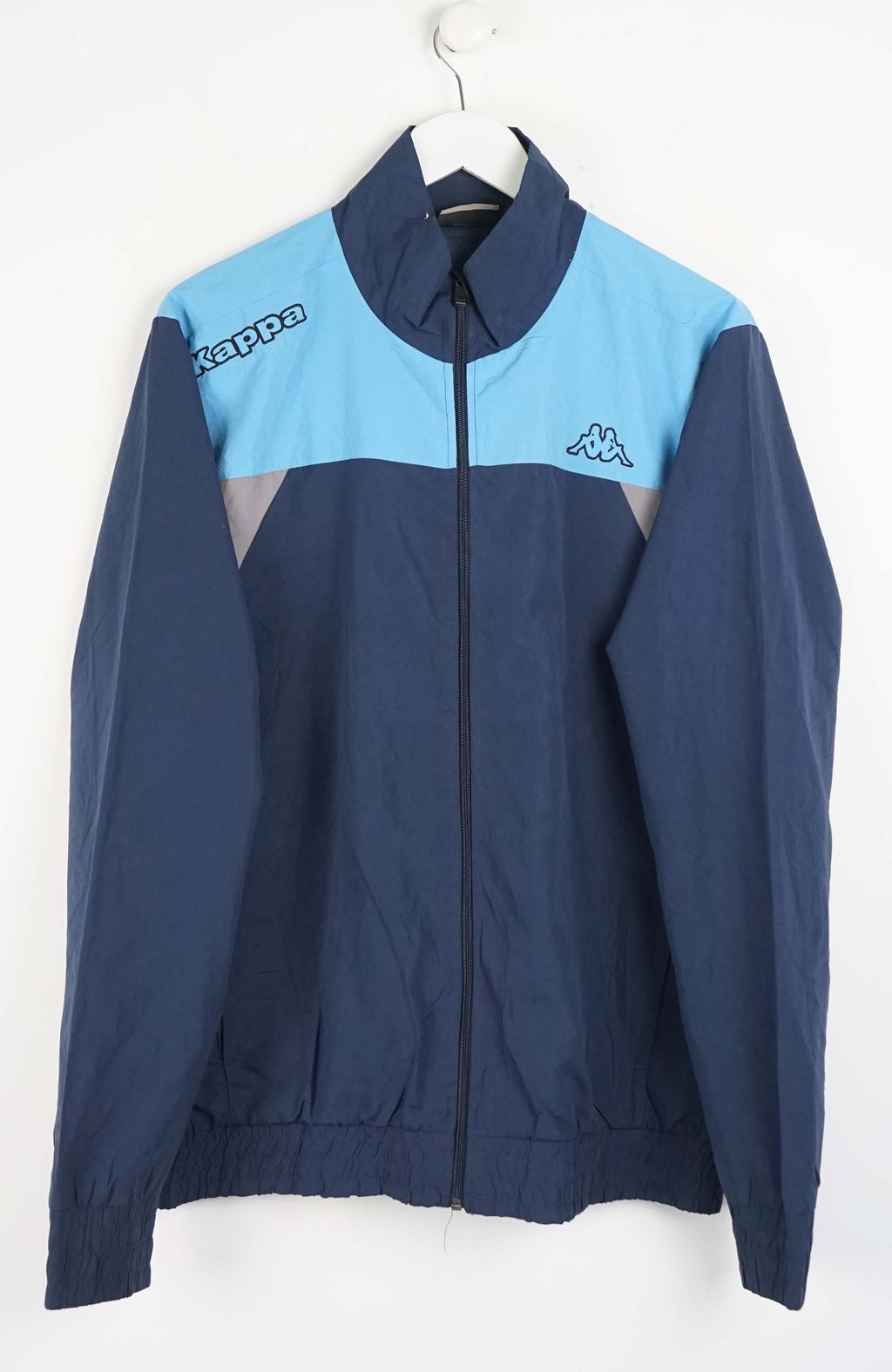 Blue and light blue jacket with Kappa logo on a white background