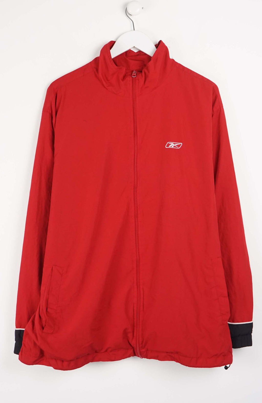 Red jacket with a logo on a white background