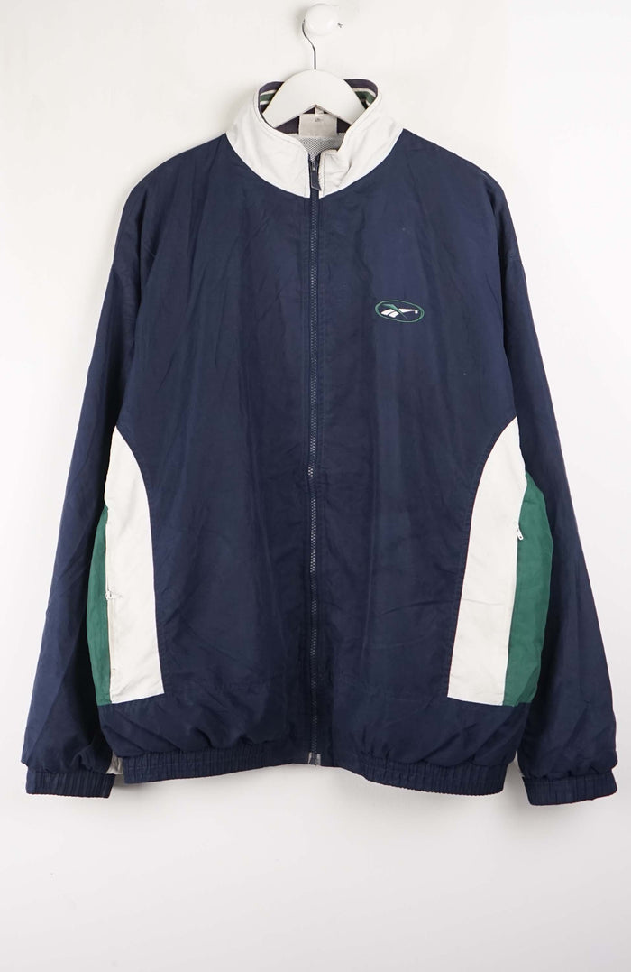 Navy blue jacket with white and green accents on a hanger against a white background